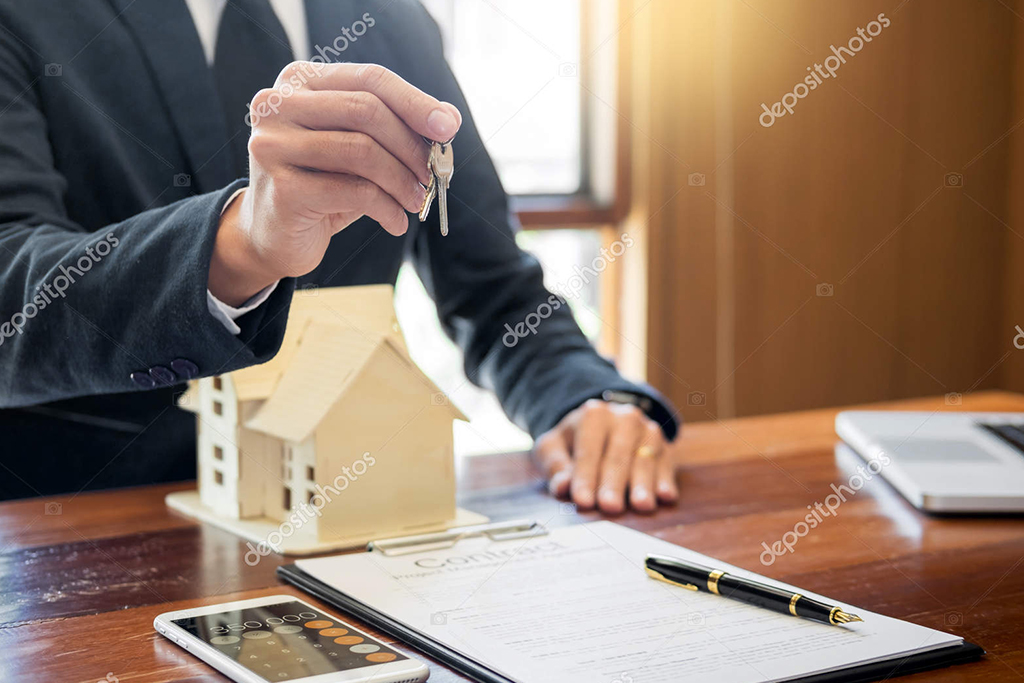 Realtor Holding House Key
