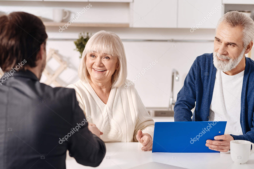 Senior Couple Handshake with Realtor
