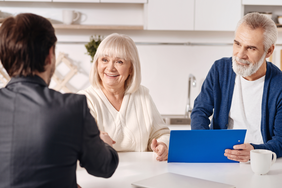 Senior Couple Handshake with Realtor Senior Couple Handshake with Realtor