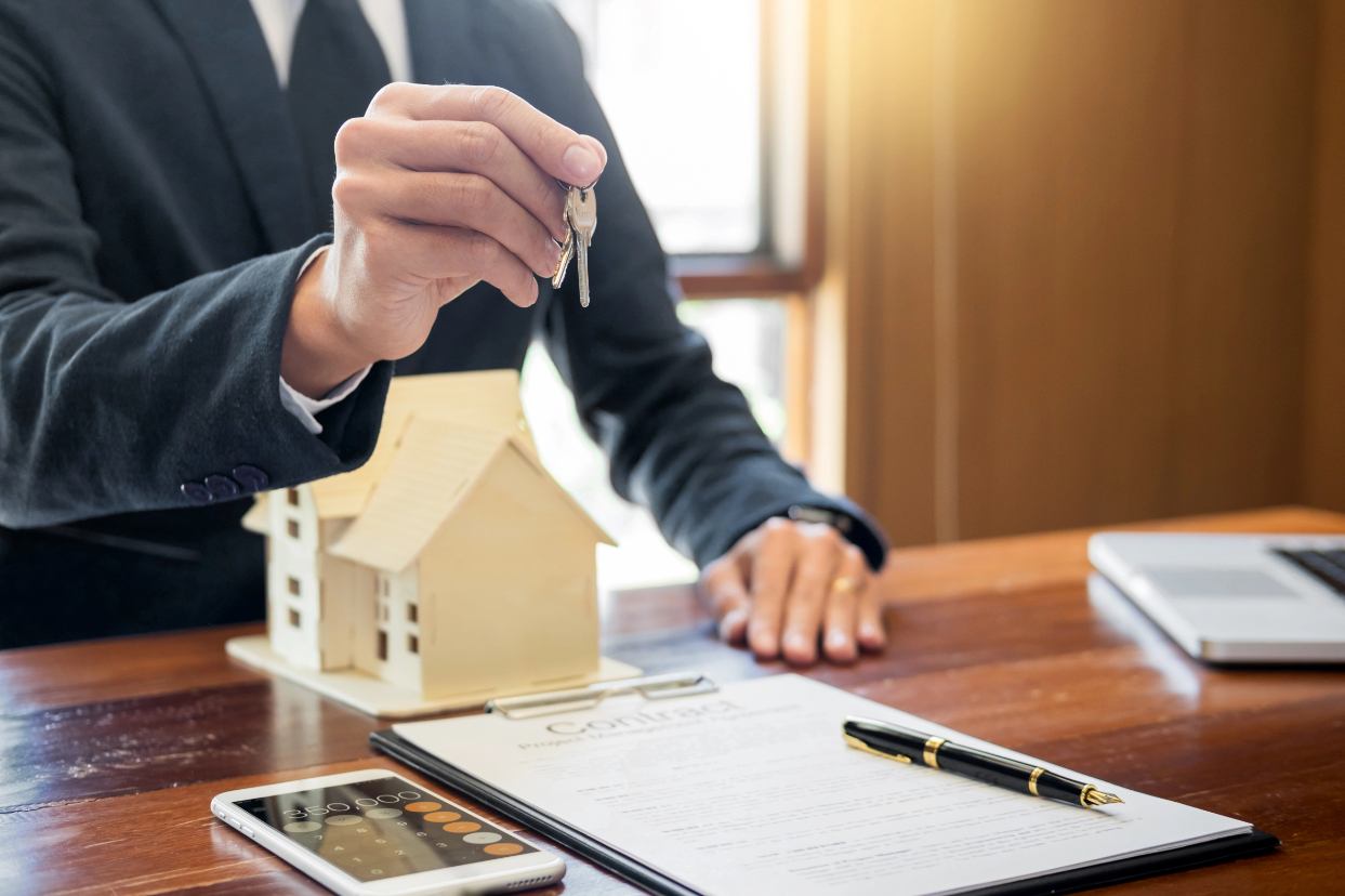 Realtor Holding House Key Realtor Holding House Key
